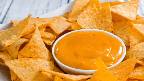 Tortilla chips with sauce in a bowl