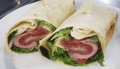 BLT Wrap with fresh lettuce, smokey bacon, and fresh cut tomato in a huge 14 inch tortilla.