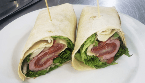 14 inch tortilla with ham lettuce, turkey, bacon, tomato, and mayonnaise.