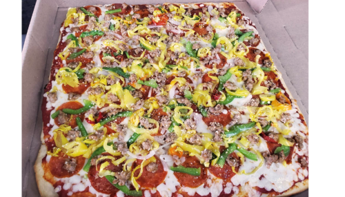 PJ Special pizza on Original PJ's Pizza menu with cheese, pepperoni, green pepper, banana pepper, onions, and hand pulled, fresh sausage.